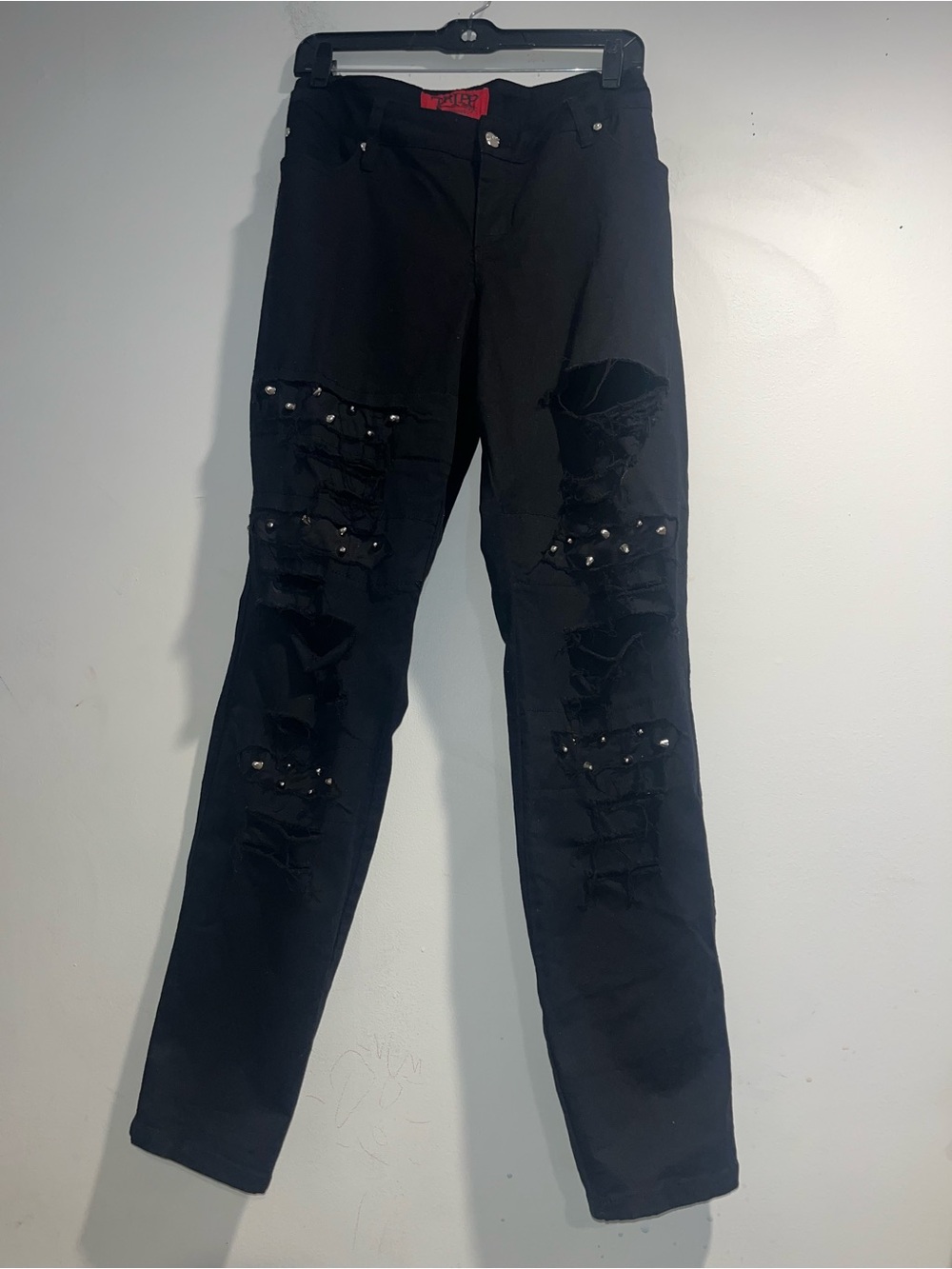 TRIPP NYC Y2K Mid-2000’s distressed shredded spike skinnies